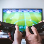 Two controllers PSVR watching World Cup in VR.