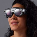 Woman wearing a Magic Leap One headset, looking forward.