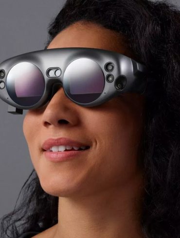 Woman wearing a Magic Leap One headset, looking forward.